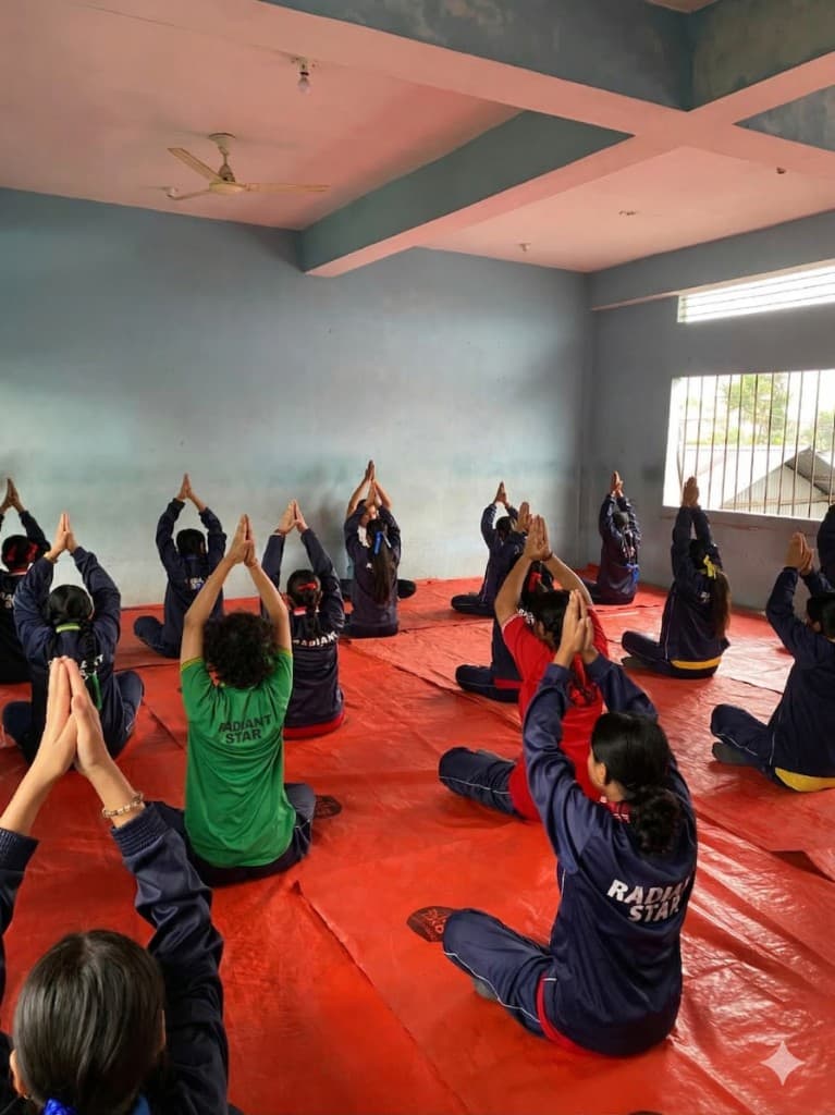 Students participating in a guided yoga session indoors